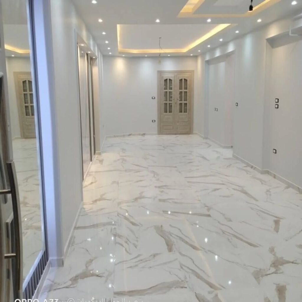 تطبيق دهان ايبوكسي أرضيات رمادي لامع لفيلا سكنية بمدينة الخرج